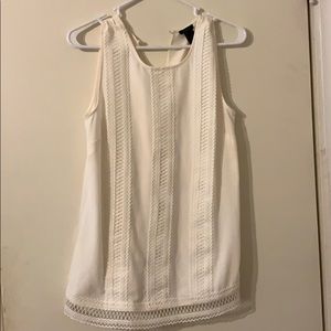 White sleeveless blouse